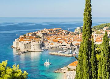 Old town Dubrovnik with red roofs and blue water