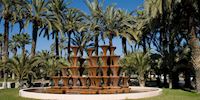 Elche Fountain with palm trees