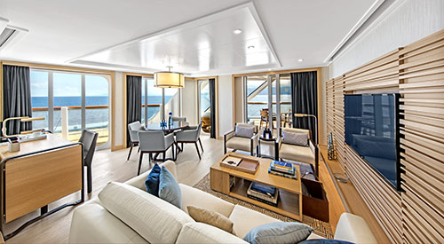 View of the Living room area of the Explorer Suite stateroom