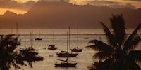 Sunset and sailboats Papeete, Tahiti